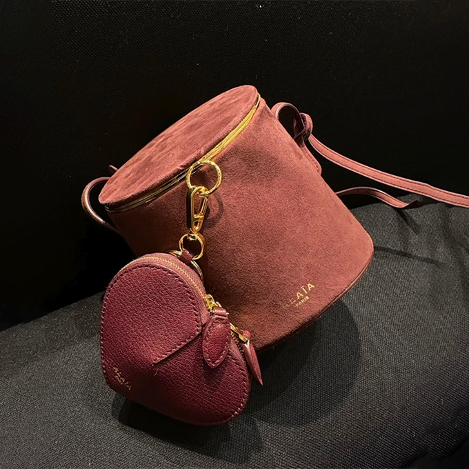 alaïa cylindrical bucket crossbody handbag
